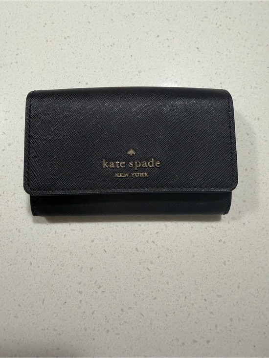 kate spade Handbags - kate spade black leather wallet with gold logo